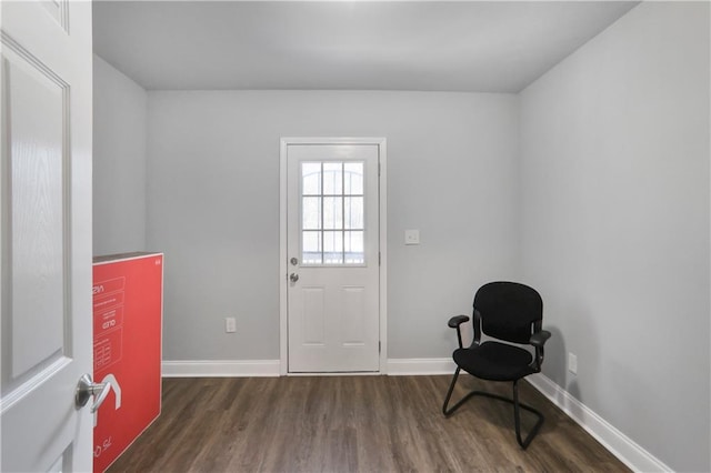 entrance foyer featuring wood finished floors and baseboards