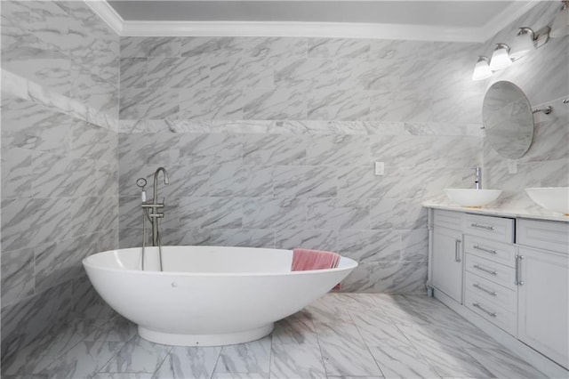 full bath featuring a sink, marble finish floor, crown molding, and double vanity