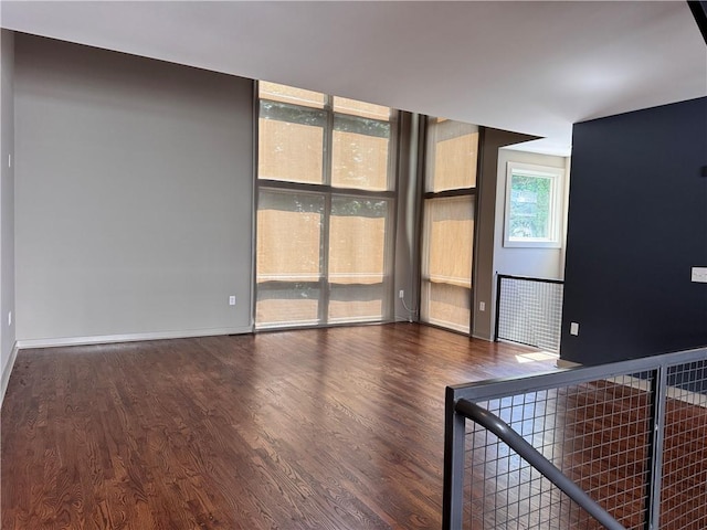 1400 Peter Haughton Way NW, Atlanta, GA 30318 - spare room with wood finished floors and floor to ceiling windows