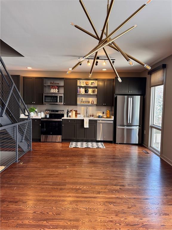 1400 Peter Haughton Way NW, Atlanta, GA 30318 - kitchen with appliances with stainless steel finishes, open shelves, light countertops, and dark wood-type flooring