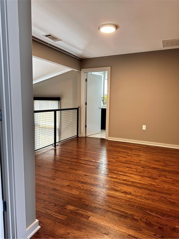 1400 Peter Haughton Way NW, Atlanta, GA 30318 - unfurnished room featuring wood finished floors and baseboards