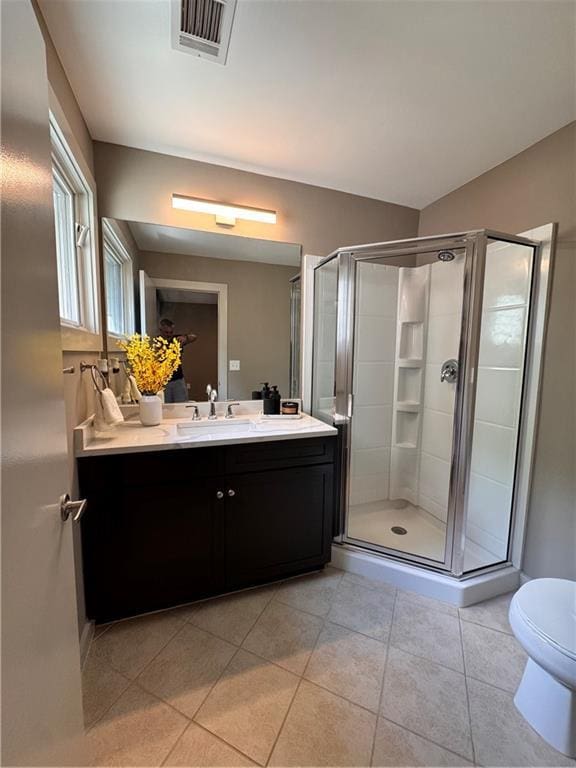 1400 Peter Haughton Way NW, Atlanta, GA 30318 - bathroom featuring vanity, a shower stall, and tile patterned flooring