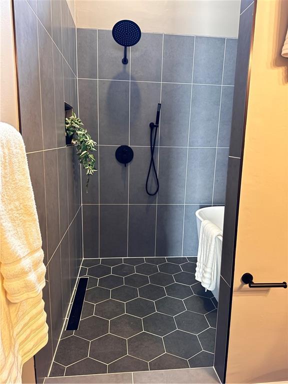 1400 Peter Haughton Way NW, Atlanta, GA 30318 - full bathroom with a tile shower and tile patterned floors
