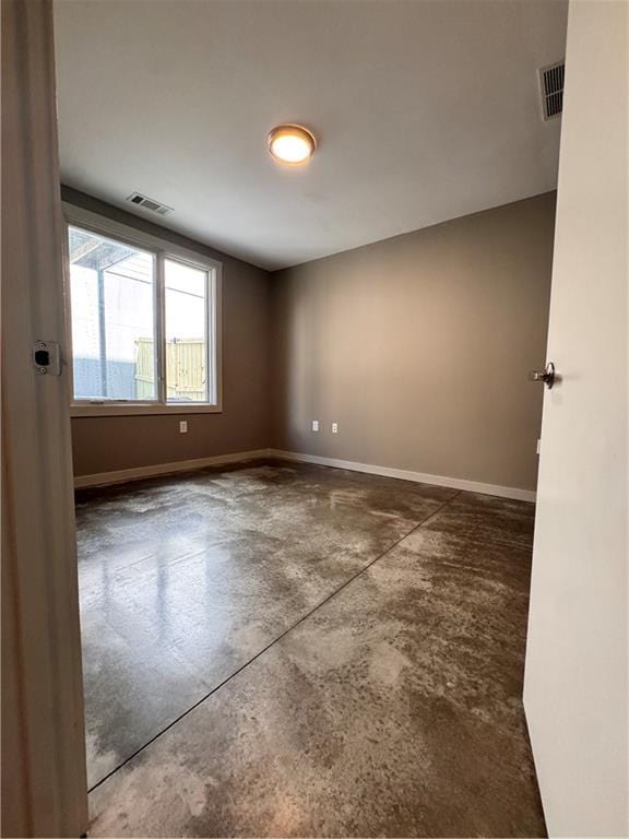 1400 Peter Haughton Way NW, Atlanta, GA 30318 - spare room featuring concrete flooring and baseboards