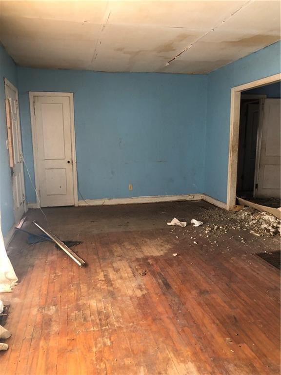 empty room featuring hardwood / wood-style floors