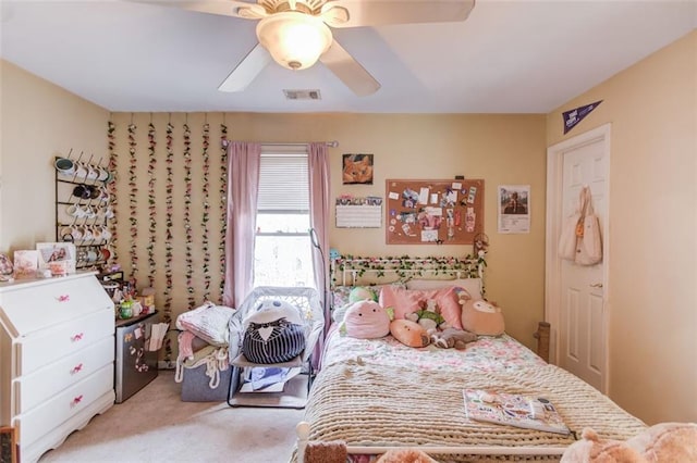 carpeted bedroom with ceiling fan