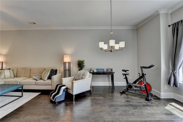 living area featuring ornamental molding, a chandelier, wood finished floors, and baseboards