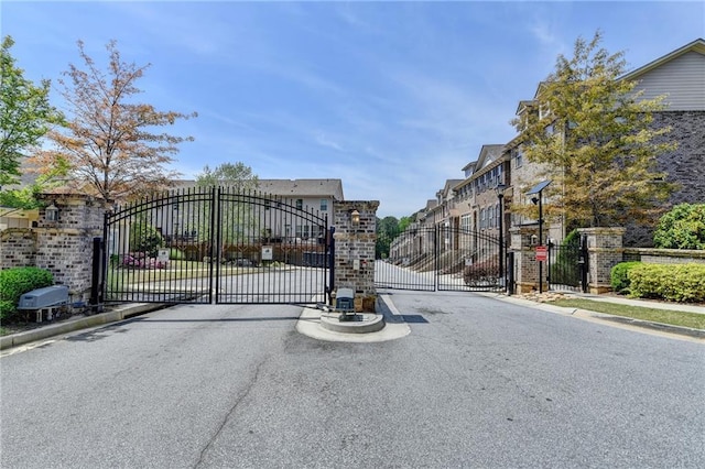 gate with a residential view and fence