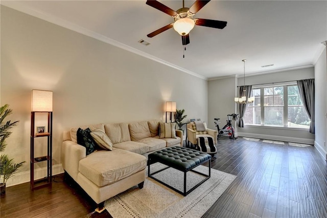 living room featuring ceiling fan, baseboards, ornamental molding, and dark wood-type flooring