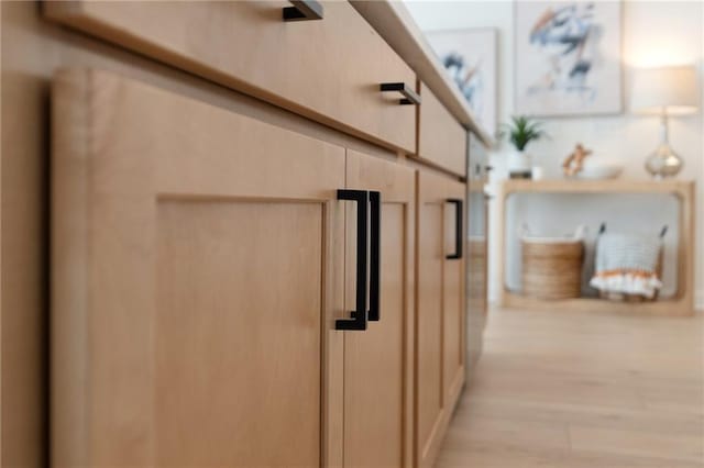 hallway featuring light wood finished floors