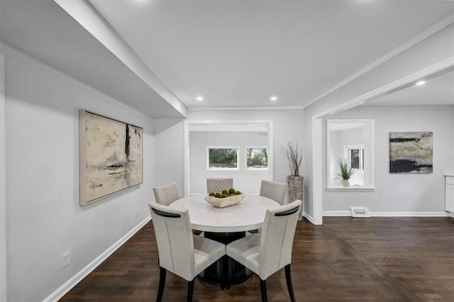 dining space with dark wood finished floors, visible vents, recessed lighting, and baseboards