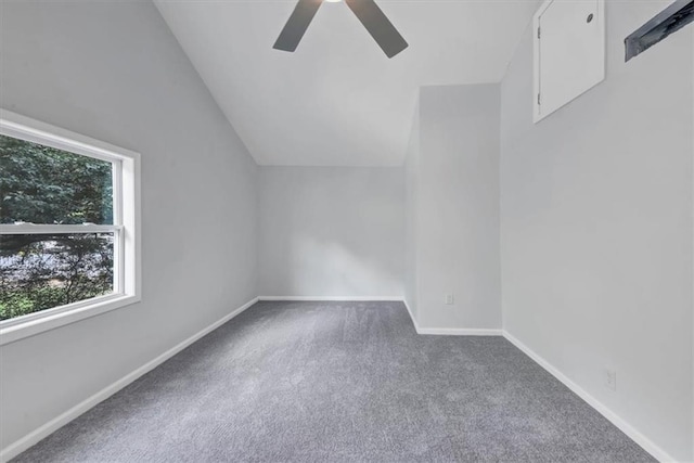 additional living space featuring ceiling fan, baseboards, carpet, and lofted ceiling