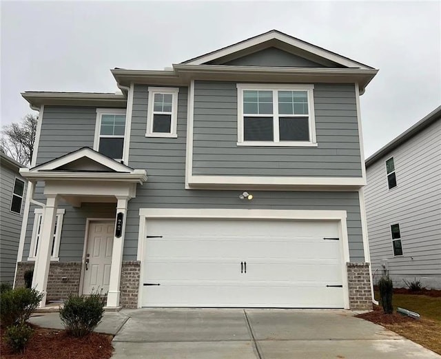 view of front of property with a garage