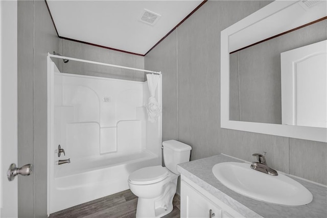 2655 Jess Guest Rd, Dewy Rose, GA 30634 - full bath with vanity, shower / tub combo, toilet, wood finished floors, and ornamental molding