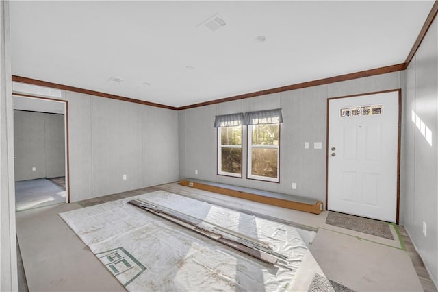 2655 Jess Guest Rd, Dewy Rose, GA 30634 - foyer entrance featuring ornamental molding and concrete flooring