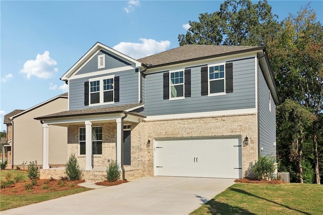 craftsman inspired home with a front yard, a garage, and central AC