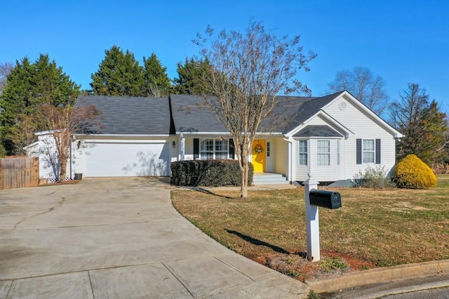 single story home featuring a garage and a front lawn