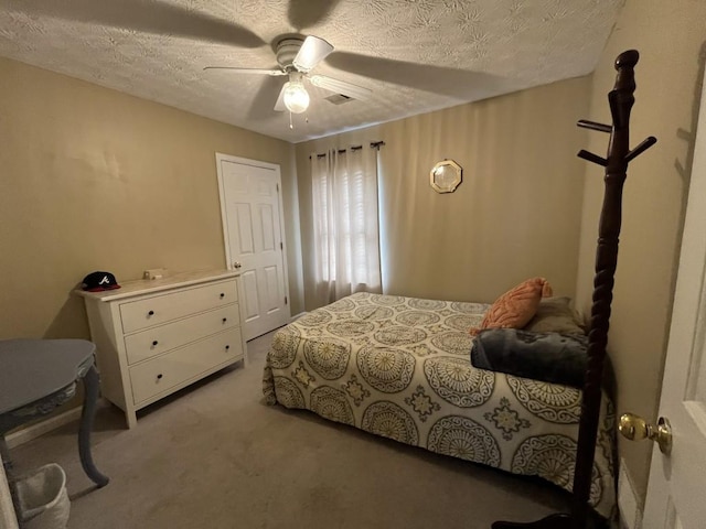 2529 Feathertree Ln, Lawrenceville, GA 30044 - bedroom featuring light colored carpet, a textured ceiling, and ceiling fan