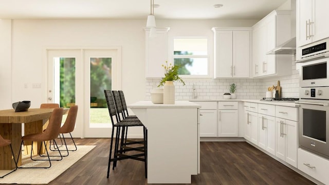 416 Valley View Trl, Canton, GA 30115 - kitchen featuring light countertops, backsplash, wall chimney range hood, dark wood-type flooring, and white cabinetry