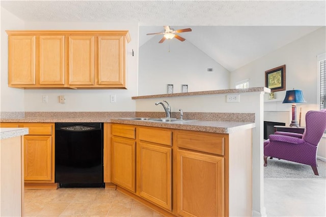 kitchen featuring ceiling fan, lofted ceiling, dishwasher, and sink