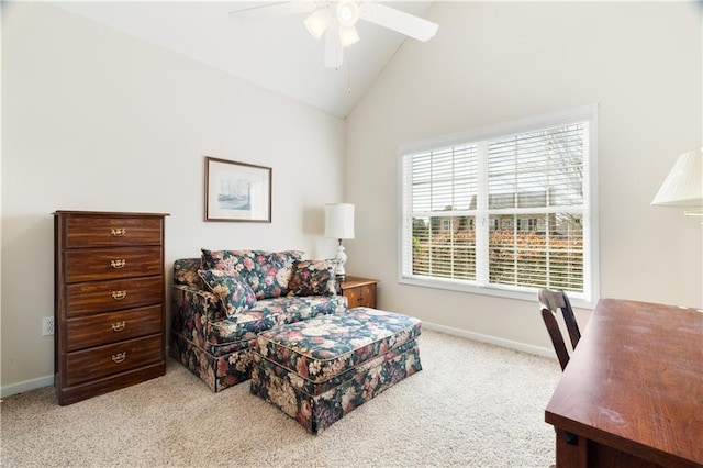 living area featuring high vaulted ceiling, light colored carpet, and ceiling fan