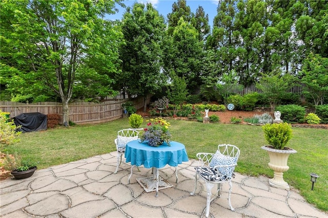 view of patio / terrace with outdoor dining area and fence