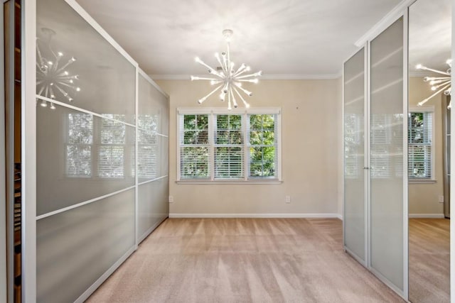 unfurnished bedroom with an inviting chandelier, ornamental molding, and light carpet