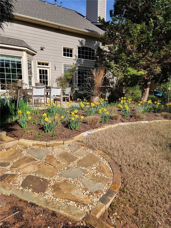 back of property featuring a patio area