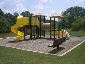 view of play area featuring a lawn