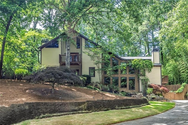 4655 Latimer Ct NE, Kennesaw, GA 30144 - view of front of house with a chimney and a balcony