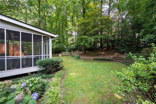 4429 Windsor Oaks Cir, Marietta, GA 30066 - view of grassy yard with a sunroom