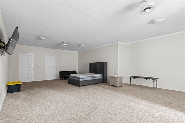 1732 Winding Woods Ln, Jonesboro, GA 30236 - carpeted bedroom featuring a textured ceiling and crown molding