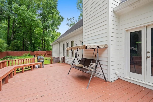 1732 Winding Woods Ln, Jonesboro, GA 30236 - wooden deck featuring a fenced backyard and a grill