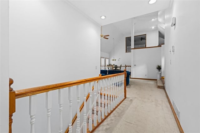 1732 Winding Woods Ln, Jonesboro, GA 30236 - hallway featuring light carpet, recessed lighting, high vaulted ceiling, and an upstairs landing
