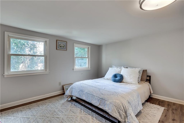 bedroom featuring hardwood / wood-style floors