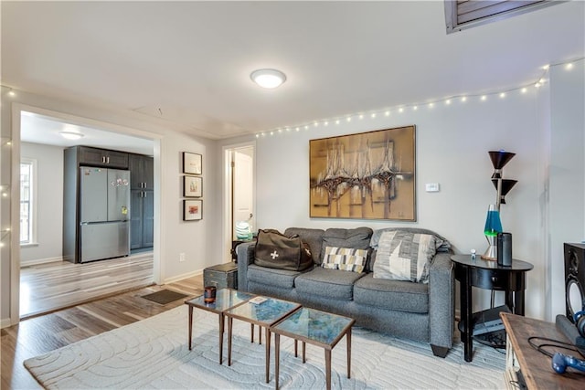 living room featuring light wood-type flooring