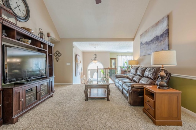 435 Flowering Trl, Grayson, GA 30017 - living area featuring vaulted ceiling, light colored carpet, and baseboards