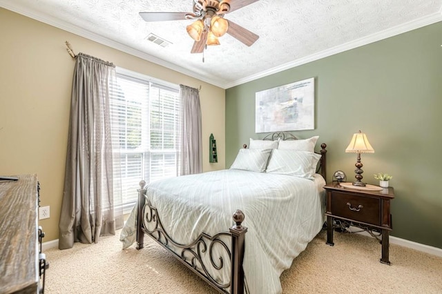 435 Flowering Trl, Grayson, GA 30017 - bedroom with light colored carpet, baseboards, ornamental molding, ceiling fan, and a textured ceiling