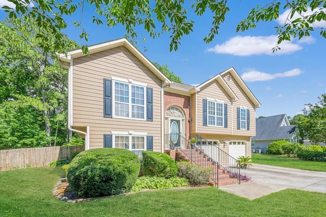 435 Flowering Trl, Grayson, GA 30017 - bi-level home with driveway and a garage