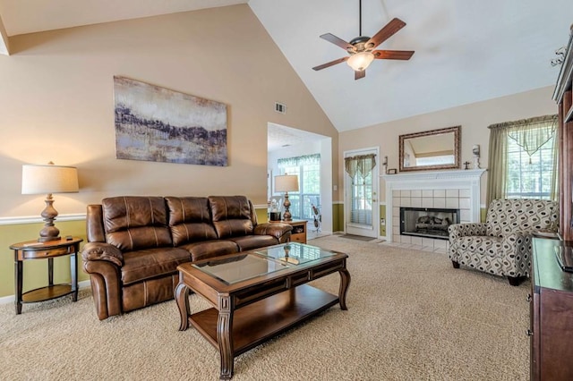 435 Flowering Trl, Grayson, GA 30017 - living room with carpet floors, a ceiling fan, high vaulted ceiling, a fireplace, and baseboards