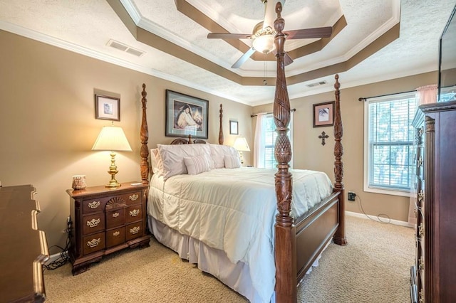 435 Flowering Trl, Grayson, GA 30017 - bedroom featuring light colored carpet, a tray ceiling, crown molding, baseboards, and a ceiling fan