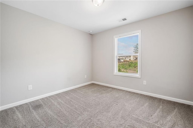 399 Cobblestone Trl, Dallas, GA 30132 - carpeted spare room featuring visible vents and baseboards