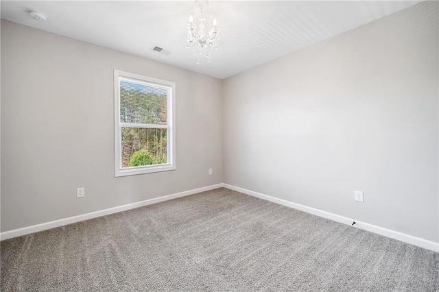 399 Cobblestone Trl, Dallas, GA 30132 - carpeted spare room with a notable chandelier, baseboards, and visible vents