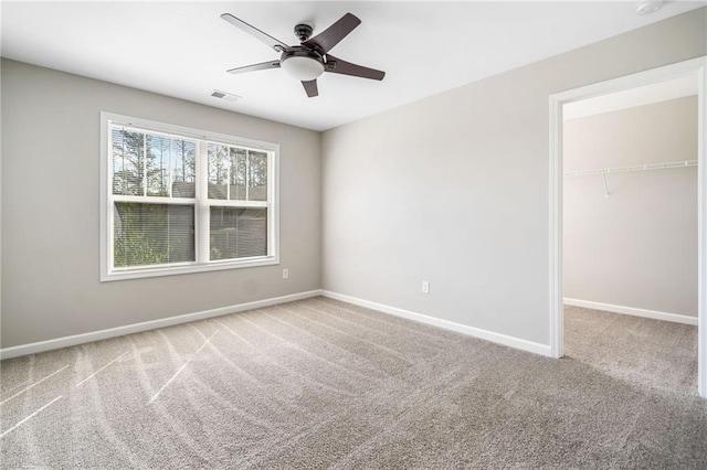 399 Cobblestone Trl, Dallas, GA 30132 - unfurnished bedroom featuring visible vents, a closet, baseboards, a spacious closet, and carpet