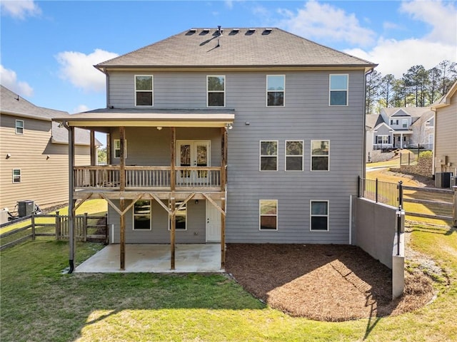 399 Cobblestone Trl, Dallas, GA 30132 - rear view of house with a fenced backyard, cooling unit, a patio, and a lawn