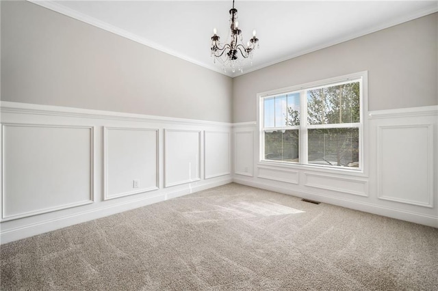 399 Cobblestone Trl, Dallas, GA 30132 - unfurnished room with an inviting chandelier, a wainscoted wall, visible vents, a decorative wall, and carpet