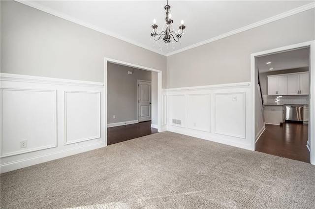 399 Cobblestone Trl, Dallas, GA 30132 - unfurnished dining area with a decorative wall, dark colored carpet, and an inviting chandelier
