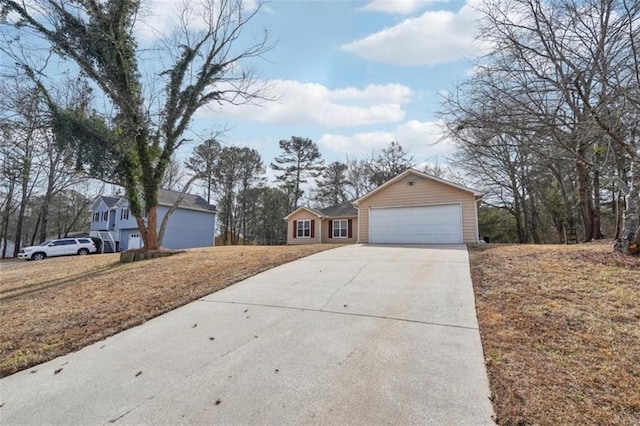 exterior space featuring a garage and a front yard