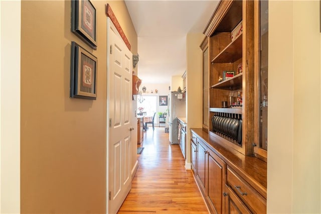 hall featuring light wood-style floors