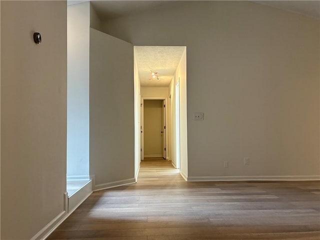 225 Magnolia Tree Ct, Johns Creek, GA 30022 - corridor featuring wood-type flooring and baseboards